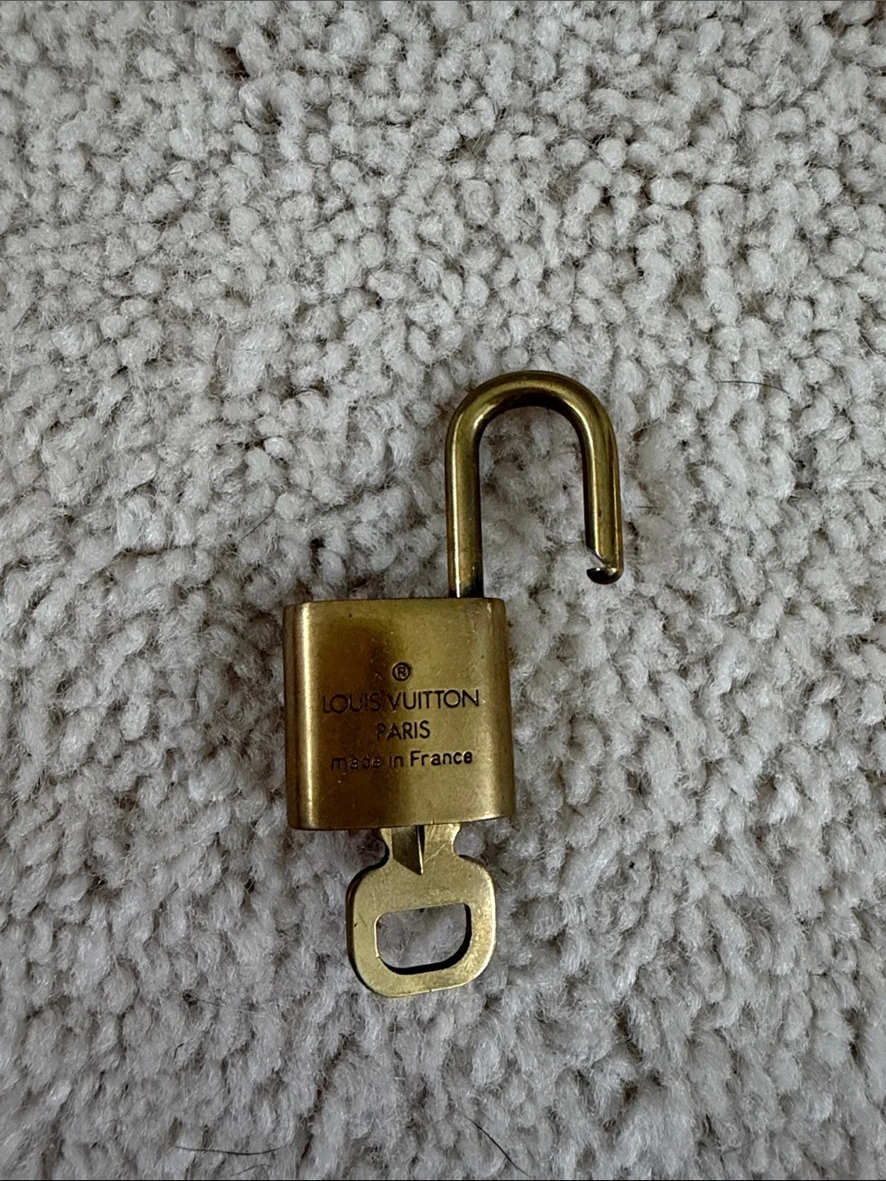 Louis Vuitton Gold Lock